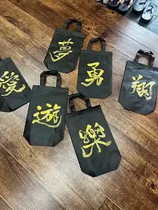 Learning Japanese Zen Calligraphy in Kimono by Osaka Castle