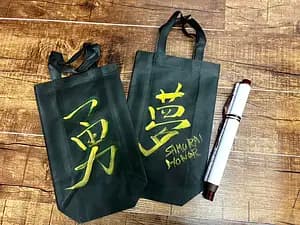 Learning Japanese Zen Calligraphy in Kimono by Osaka Castle